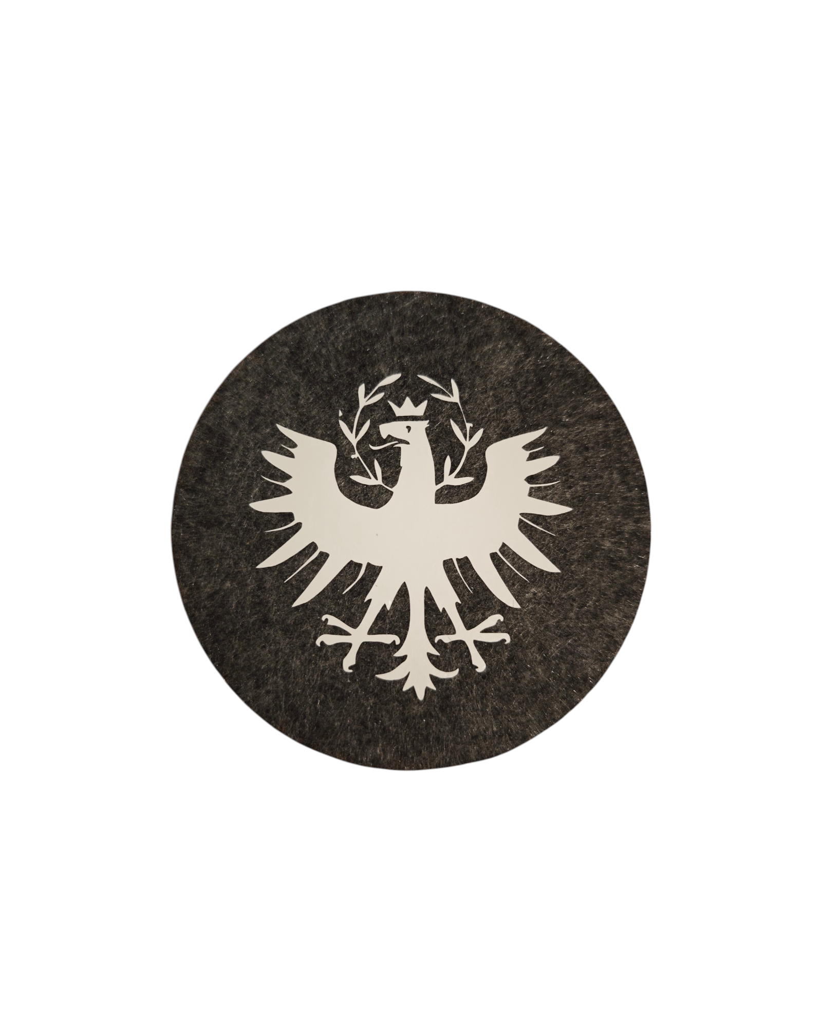 Untersetzer in dunkelgrauem Filz mit weißem Tiroler Adler. 