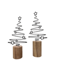 Weihnachtlicher Wackelbäumchen aus Metall auf Sockel aus Baumstamm. Erhältlich in zwei Größen. 
